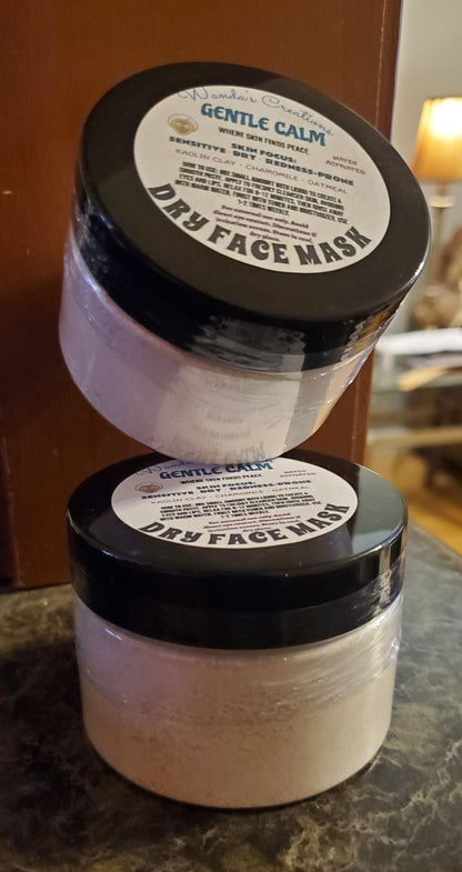 Two jars of 'Gentle Calm' dry face mask on a marble surface.