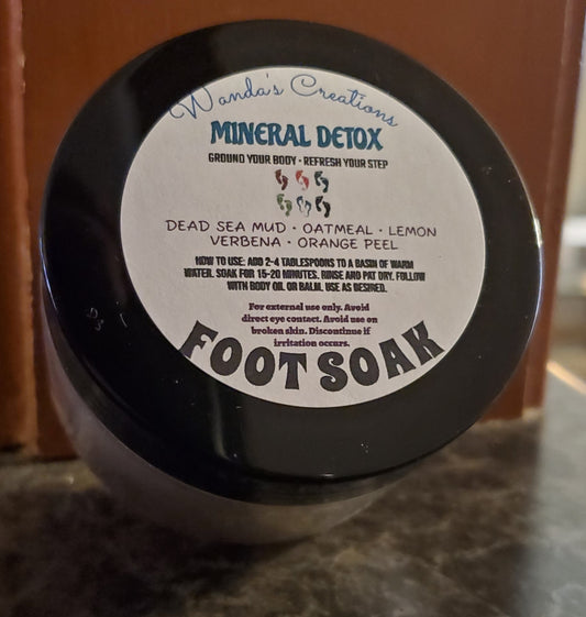 Foot soak container with label on a wooden surface