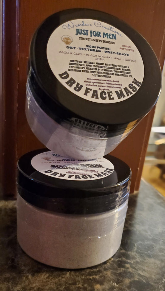 Two containers of 'Just For Men' dry face mask on a wooden surface.